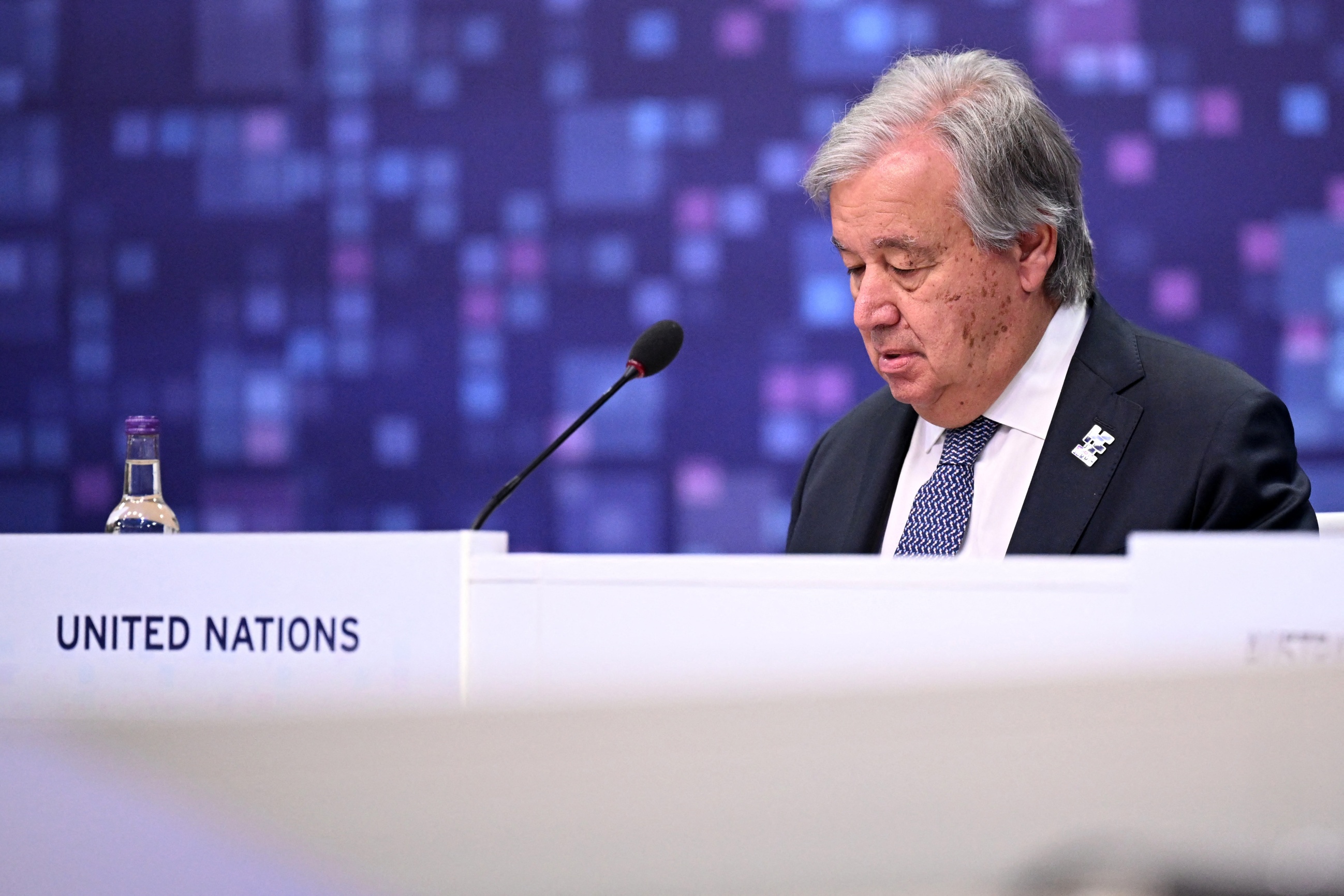 UN Secretary-General António Guterres speaking at a podium