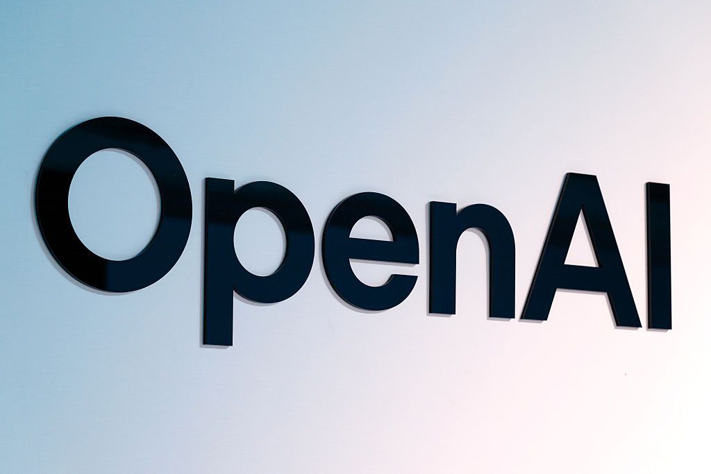 The OpenAI logo on a smartphone screen