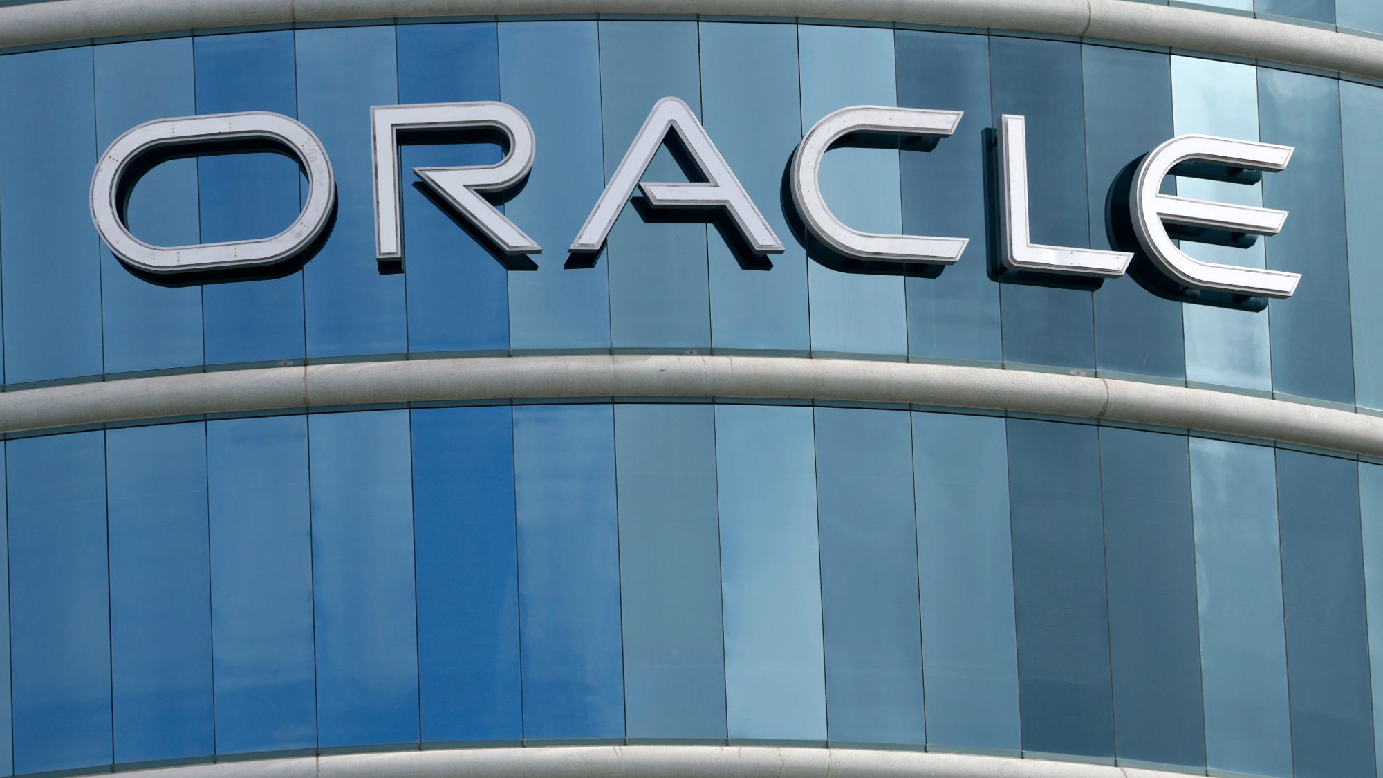 Tech workers outside office buildings with layoff notices