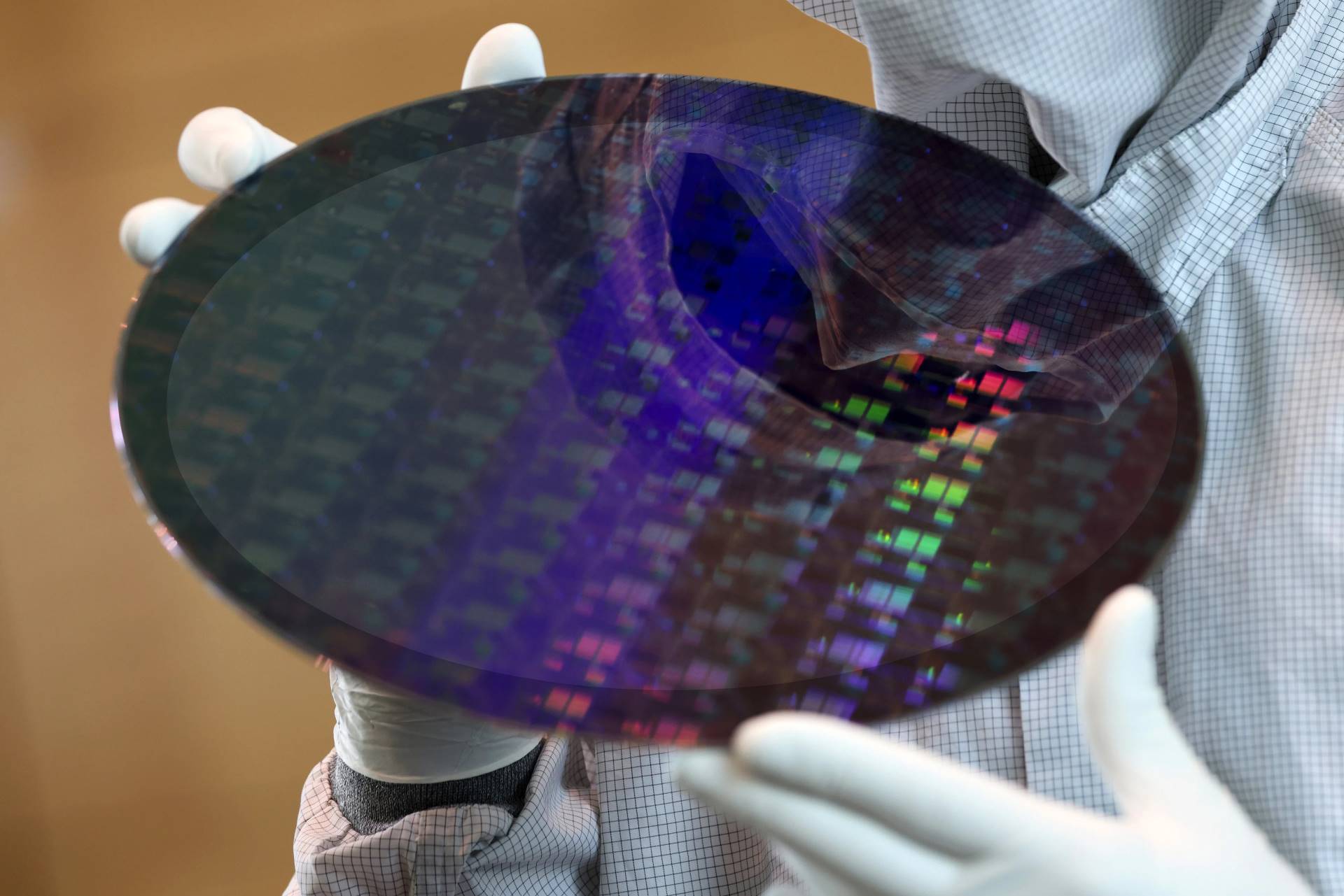 A TSMC silicon wafer, whose pricing across mature nodes is now rising on AI demand